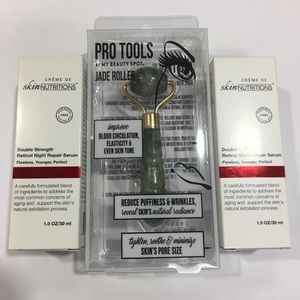 Set of two bottles of retinol and one Jade roller.